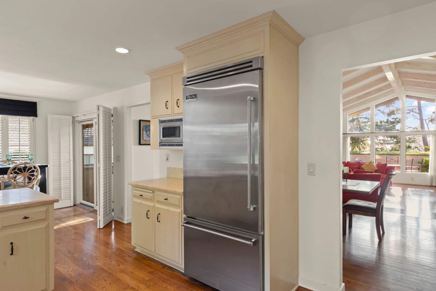 3041 Strawberry Hill Road Pebble Beach, CA 93953 - Photo 10 of 31 a kitchen with stainless steel appliances granite countertop a refrigerator and a stove top oven
