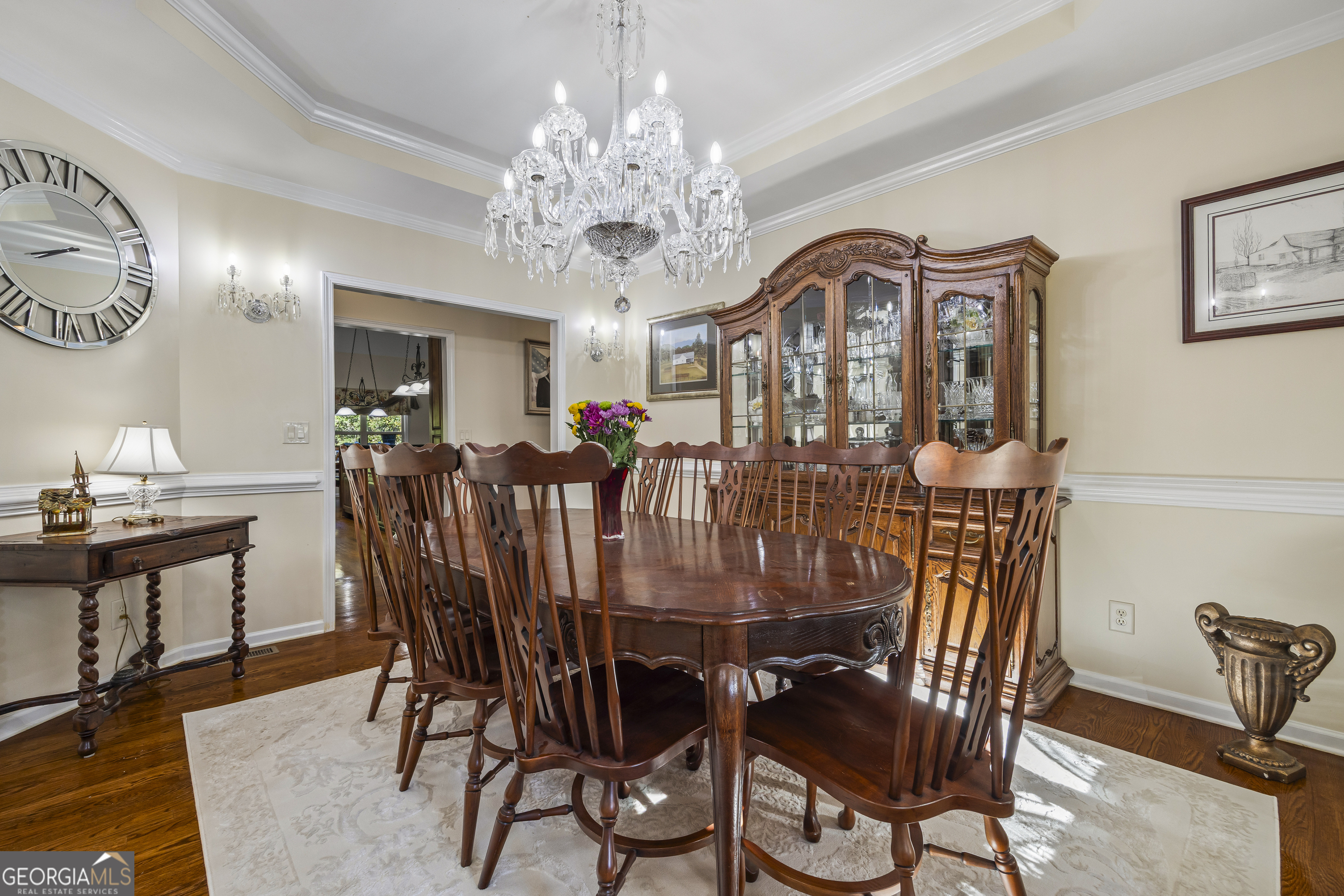 135 Canters Run Homer, GA 30547 - Photo 19 of 96 a view of a dining room with furniture a chandelier and wooden floor
