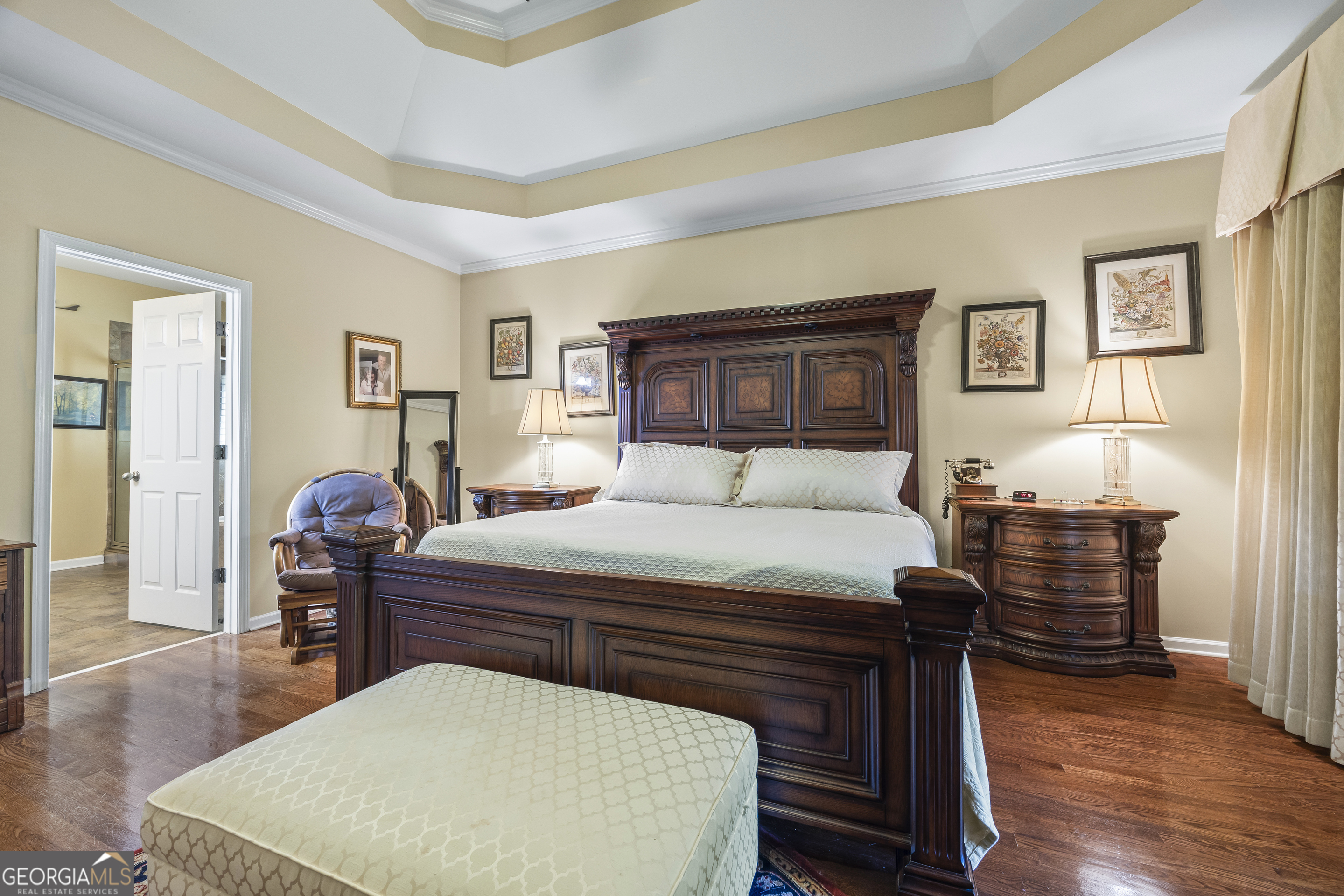 135 Canters Run Homer, GA 30547 - Photo 34 of 96 a bedroom with a bed and wooden floor