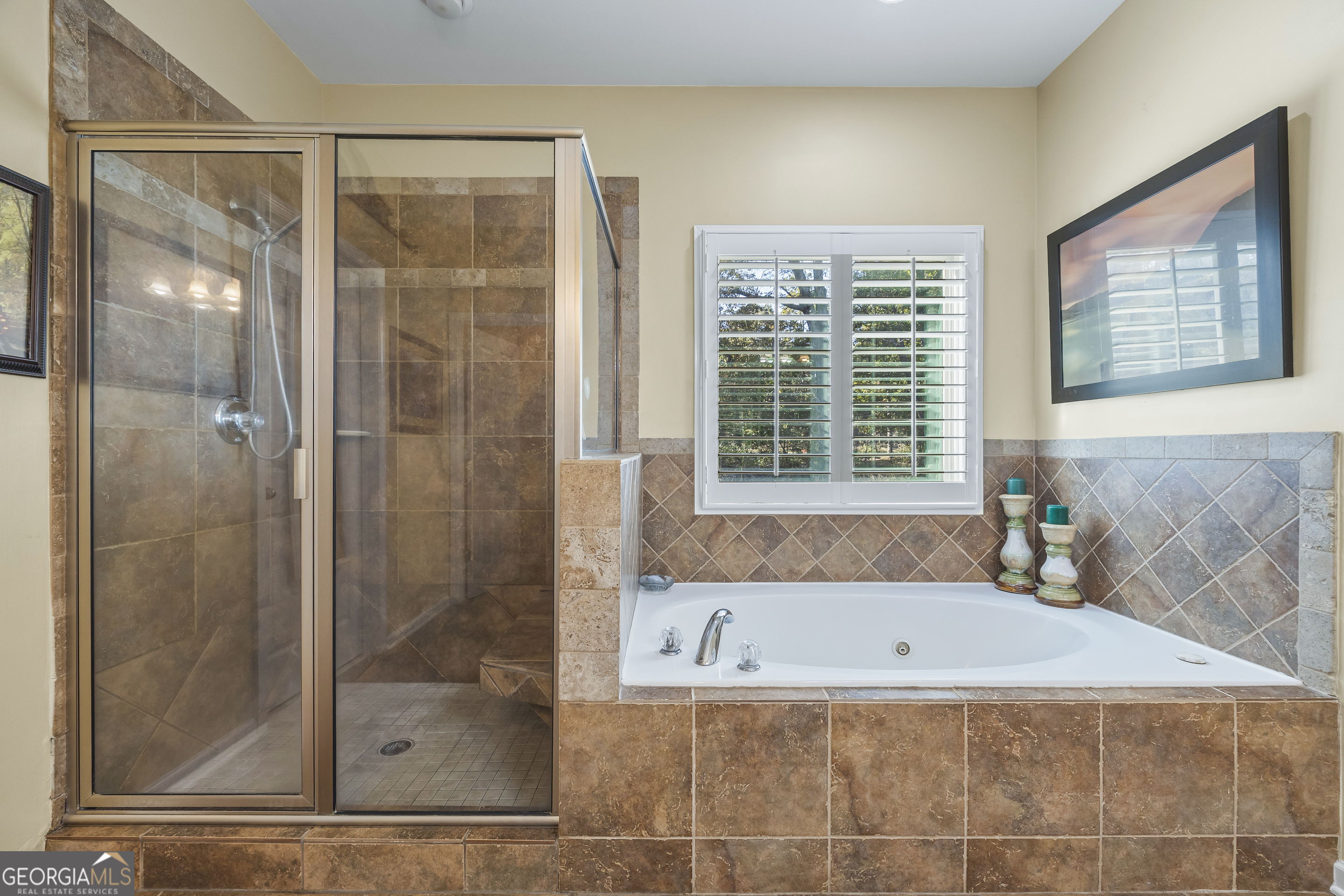 135 Canters Run Homer, GA 30547 - Photo 40 of 96 a bathroom with a bathtub and shower