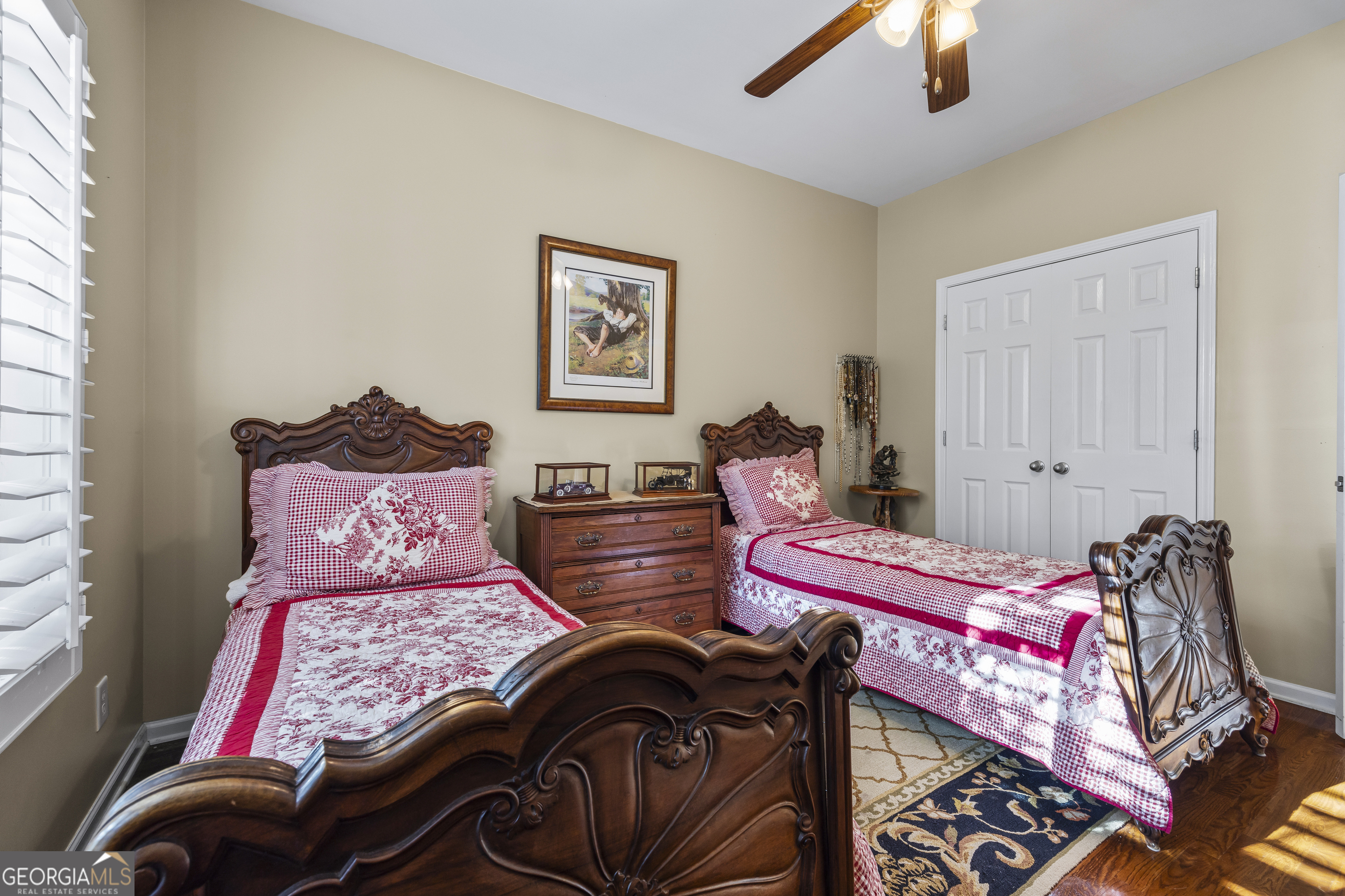 135 Canters Run Homer, GA 30547 - Photo 42 of 96 a bedroom with a bed and a chandelier