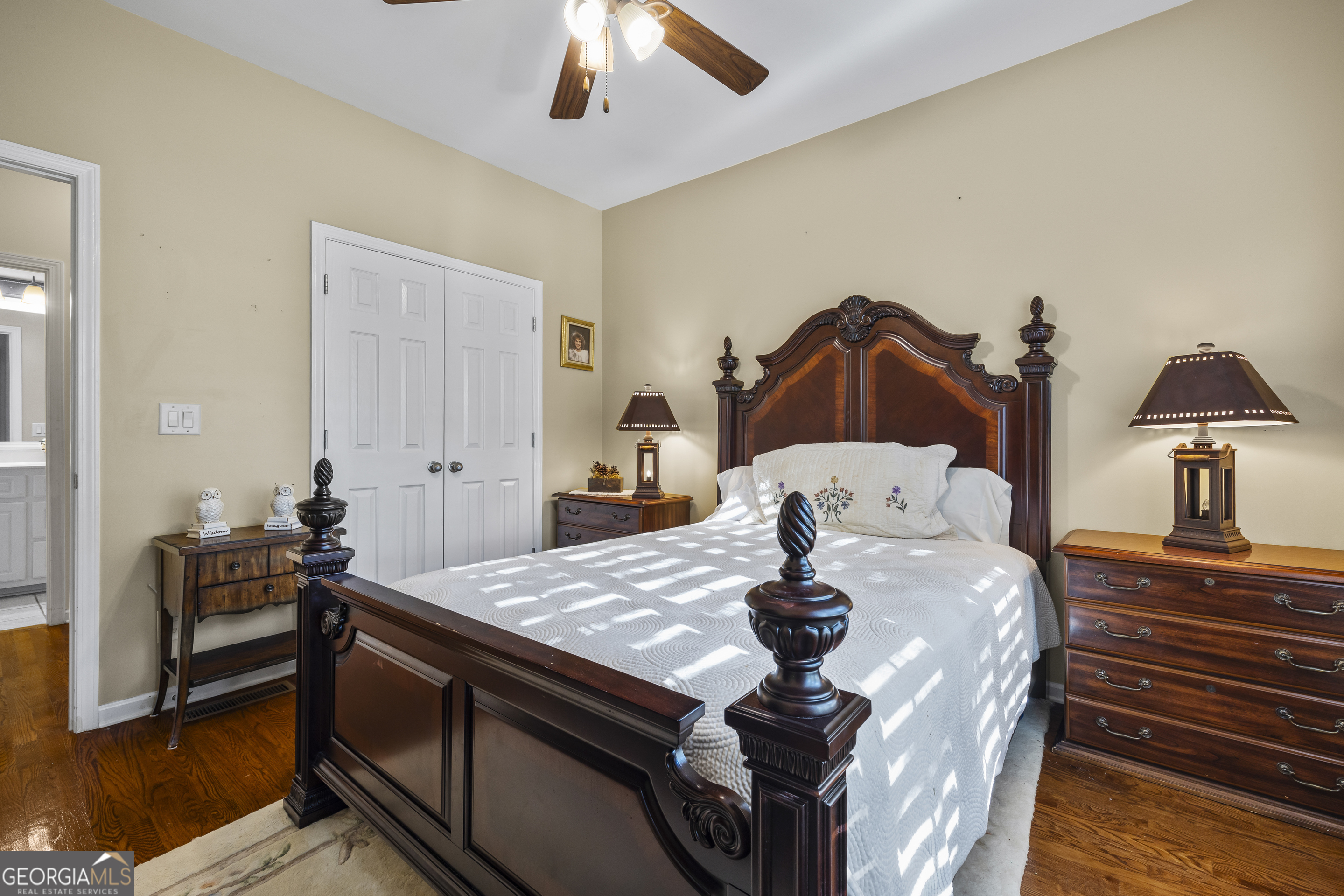 135 Canters Run Homer, GA 30547 - Photo 45 of 96 a living room with a table chairs and a chandelier