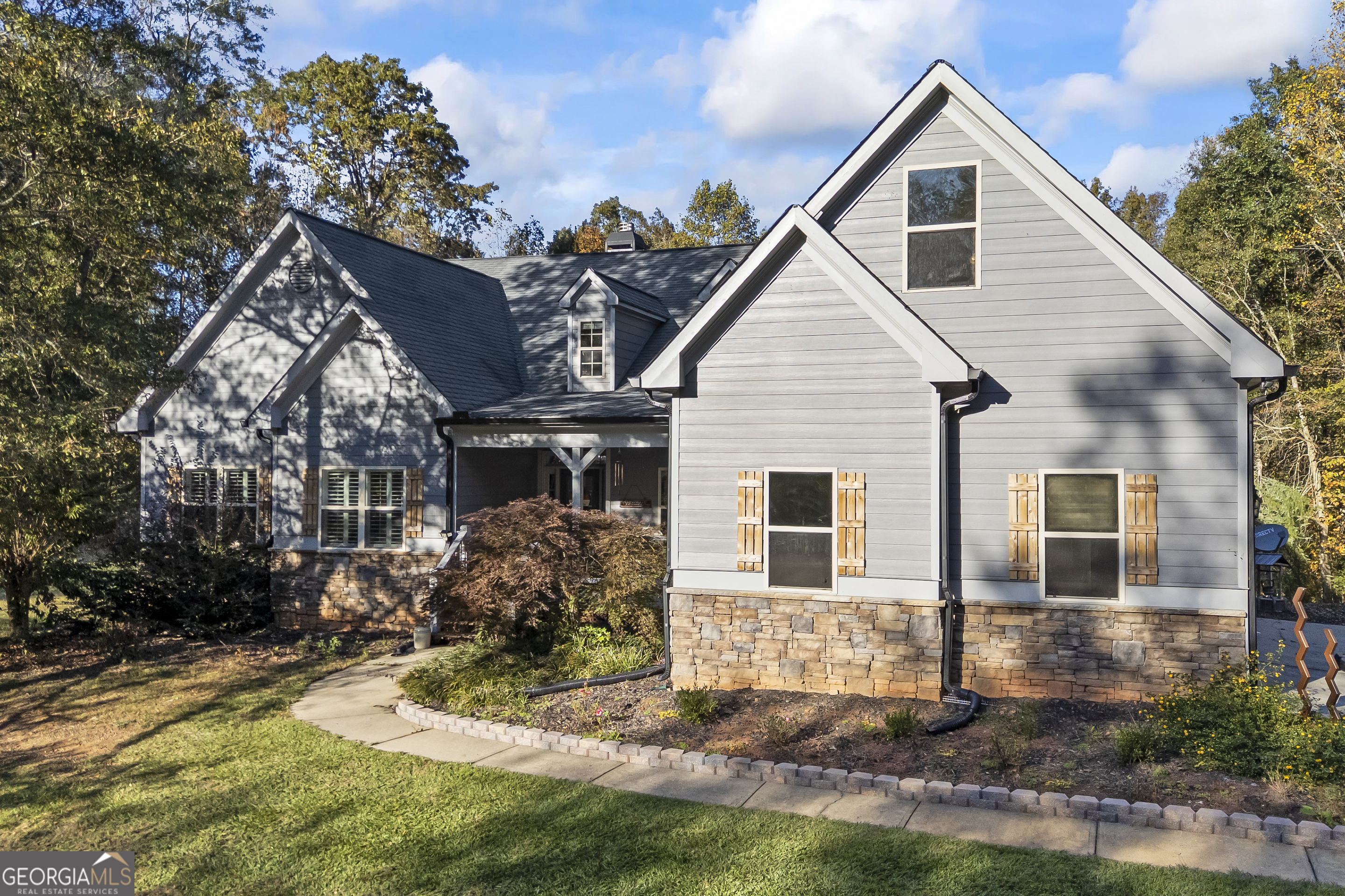 135 Canters Run Homer, GA 30547 - Photo 5 of 96 a view of a house with yard and plants