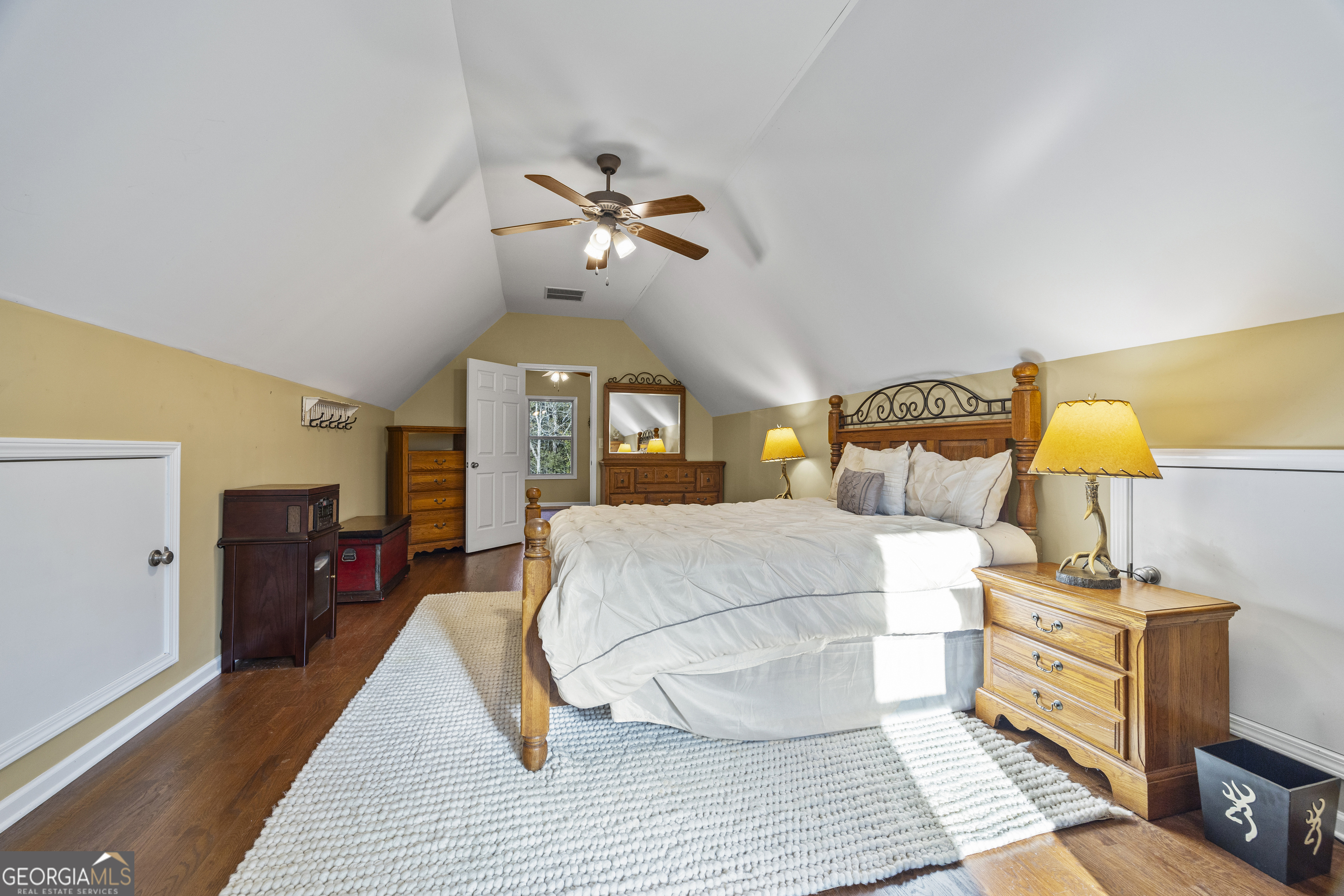 135 Canters Run Homer, GA 30547 - Photo 63 of 96 a bedroom with a bed and wooden floor