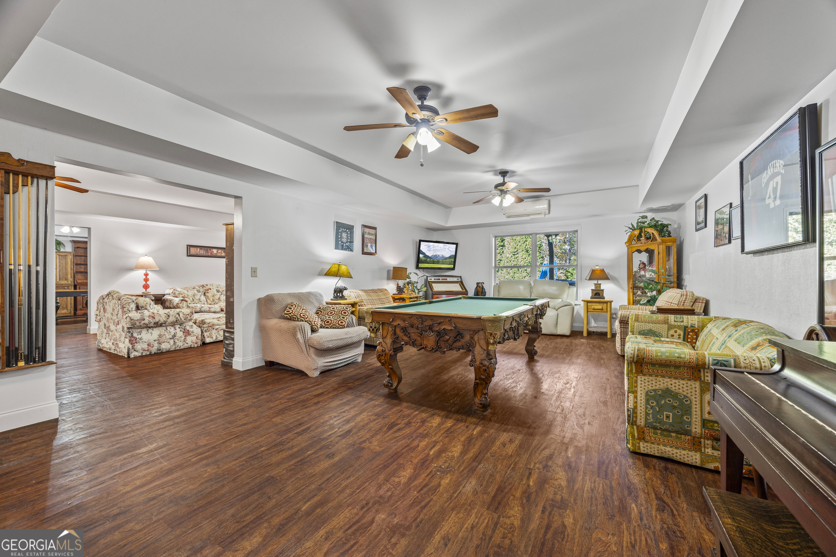 135 Canters Run Homer, GA 30547 - Photo 65 of 96 a living room with furniture and wooden floor