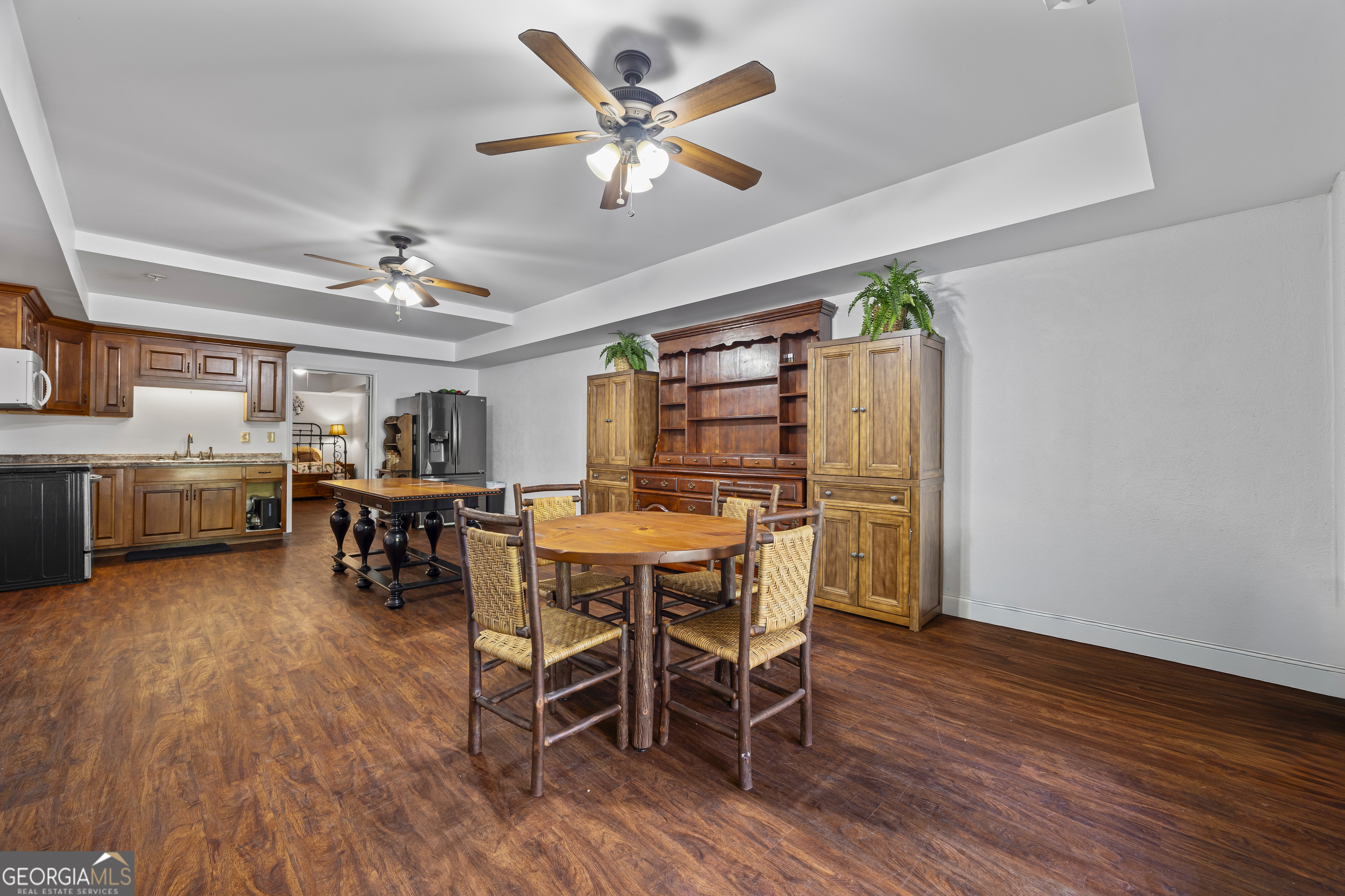 135 Canters Run Homer, GA 30547 - Photo 77 of 96 a view of a dining room with furniture and a chandelier