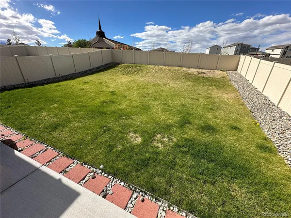 a view of an outdoor space and backyard
