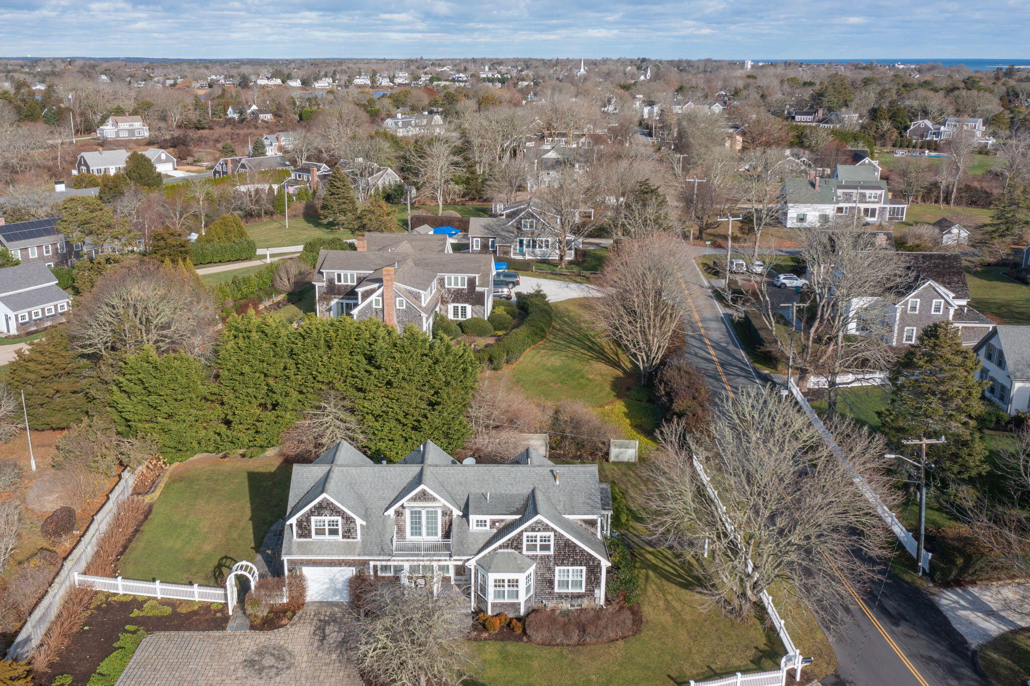 an aerial view of residential houses with outdoor space