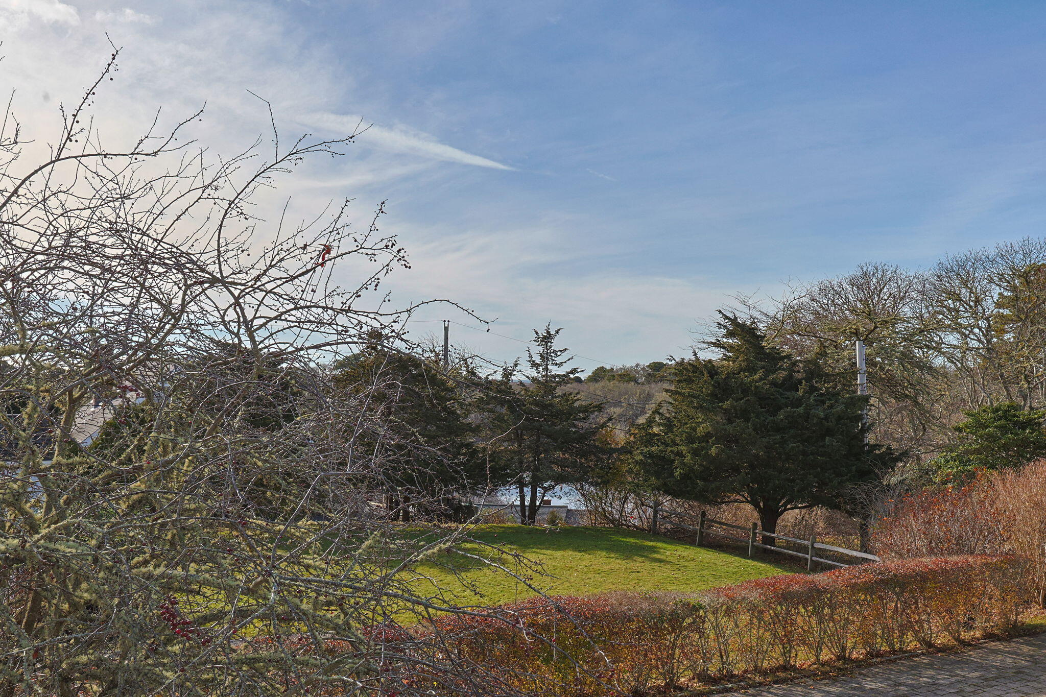 404 Stage Harbor Road Chatham, MA 02633 - Photo 47 of 94 a swimming pool with trees in the background