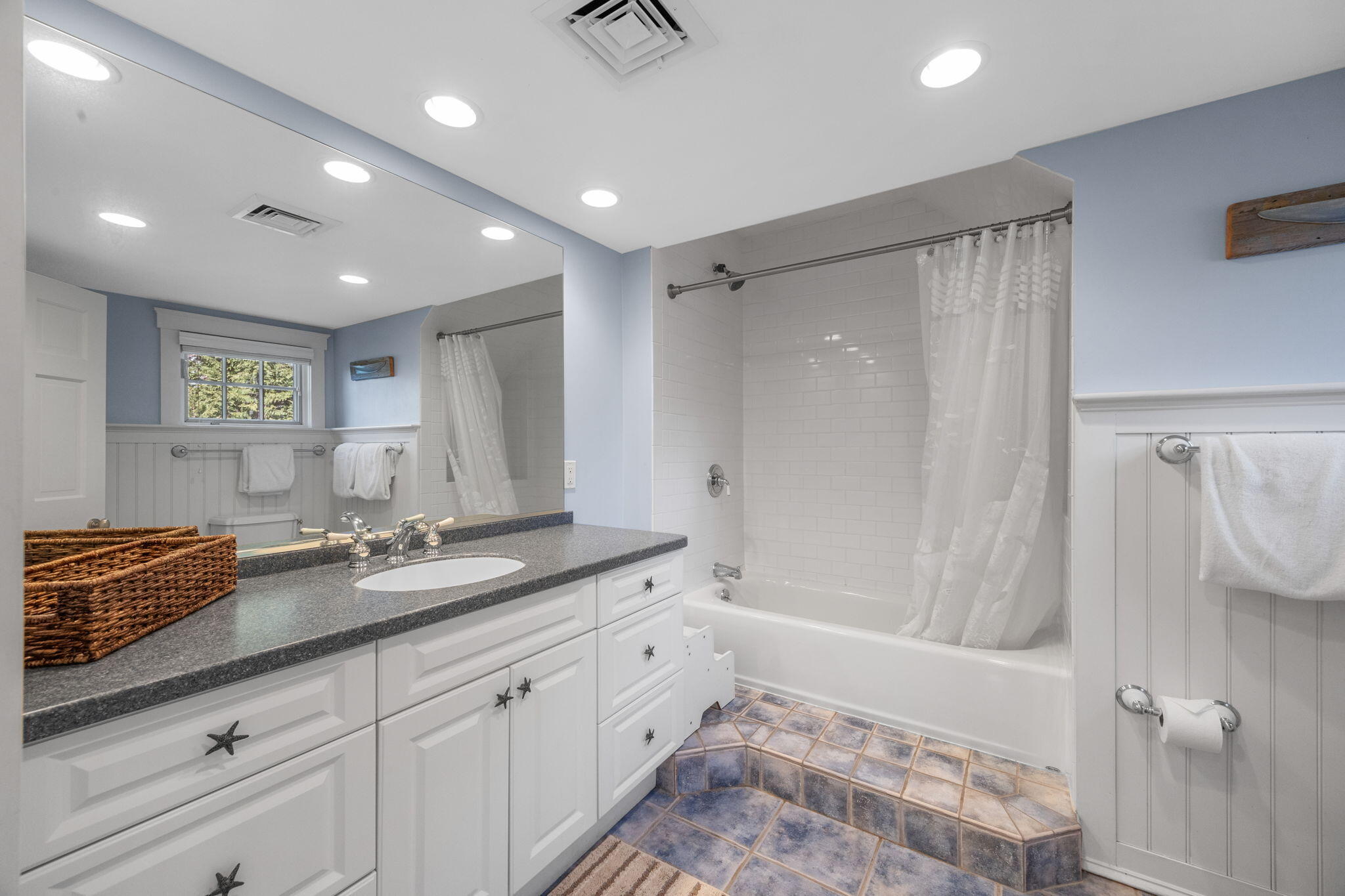 404 Stage Harbor Road Chatham, MA 02633 - Photo 60 of 94 a bathroom with a double vanity sink and mirror with shower