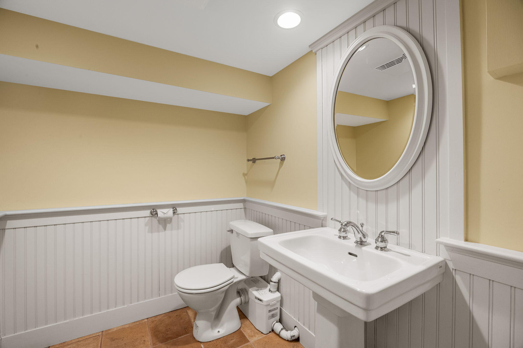 404 Stage Harbor Road Chatham, MA 02633 - Photo 70 of 94 a bathroom with a sink mirror and toilet