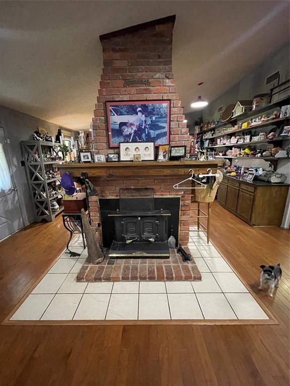 658 Cook Baker Road Sarepta, LA 71071 - Photo 3 of 8 a living room with furniture a rug and chairs