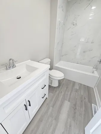 a bathroom with a sink and a toilet
