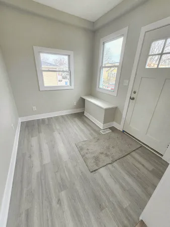 an empty room with windows