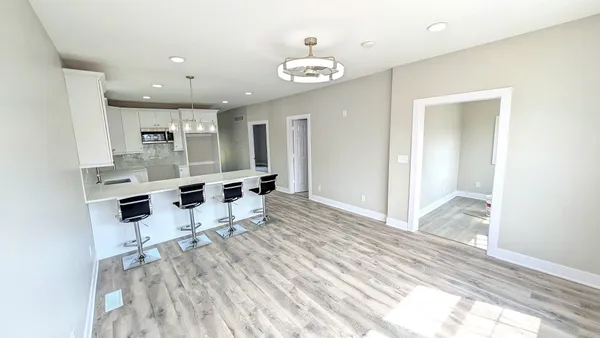 a view of a living room and dining room