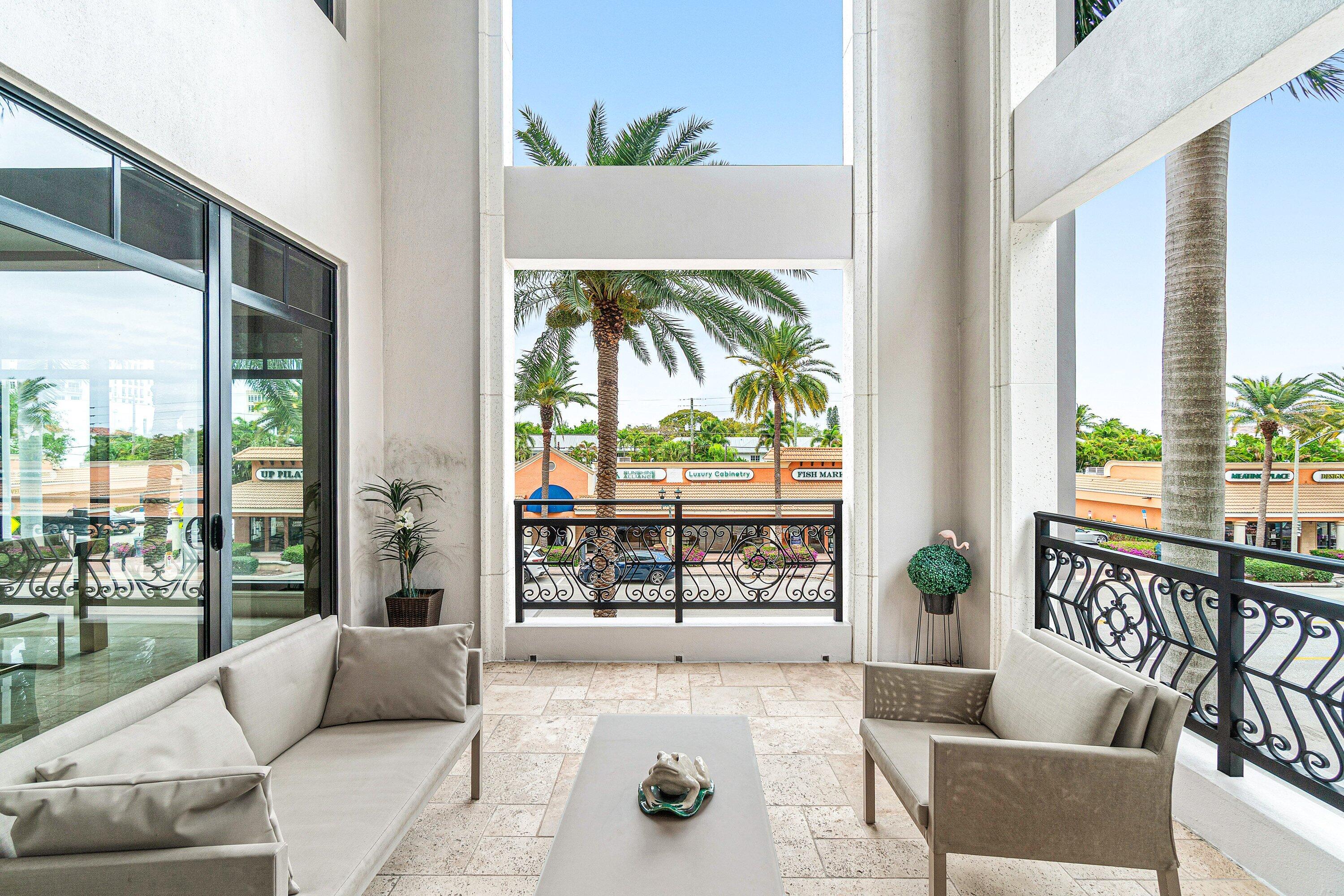 200 East Palmetto Park Road, Unit 22 Boca Raton, FL 33432 - Photo 13 of 44 a outdoor living space with furniture and a potted plant