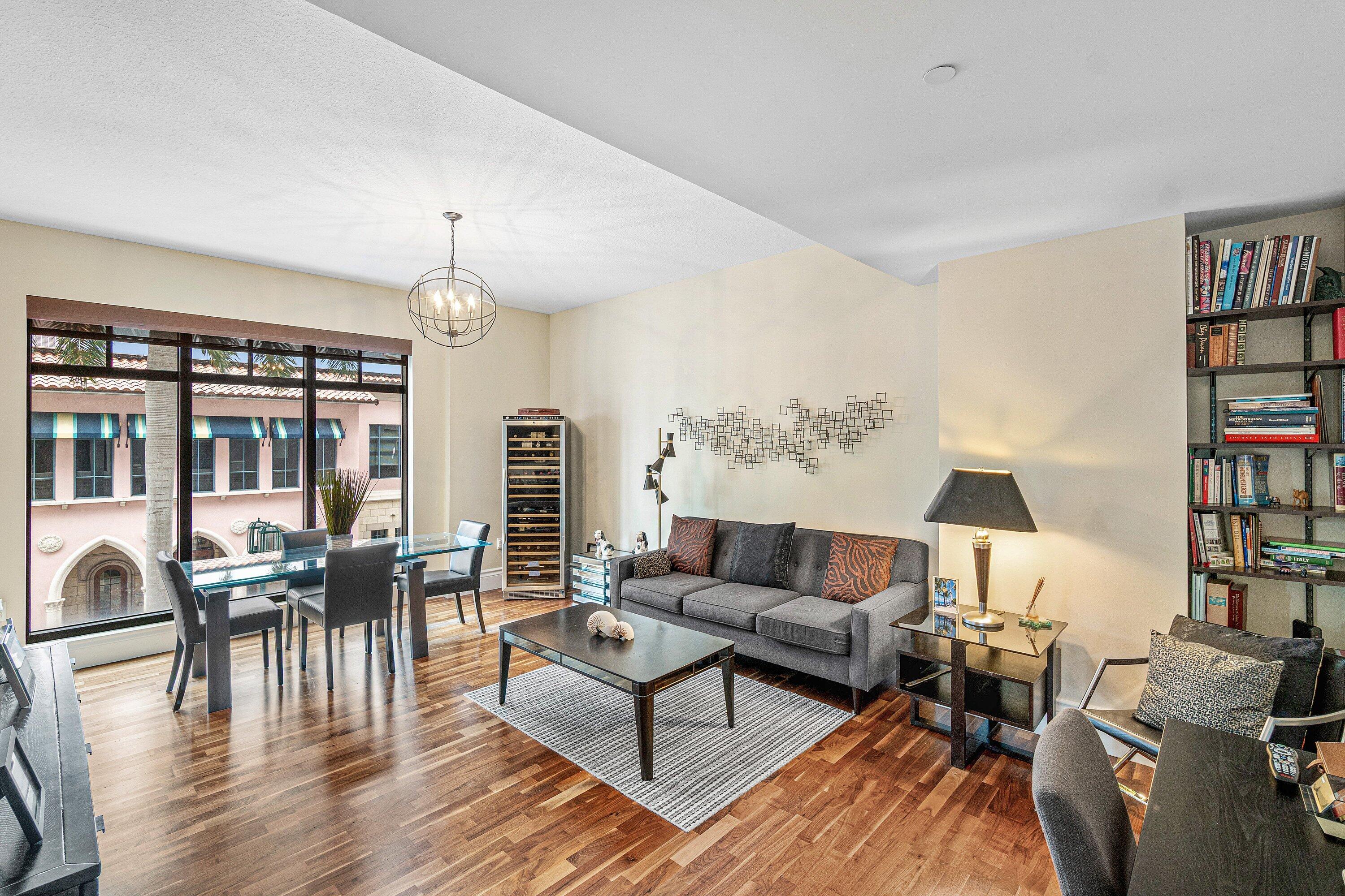 200 East Palmetto Park Road, Unit 22 Boca Raton, FL 33432 - Photo 17 of 44 a living room with furniture and a wooden floor