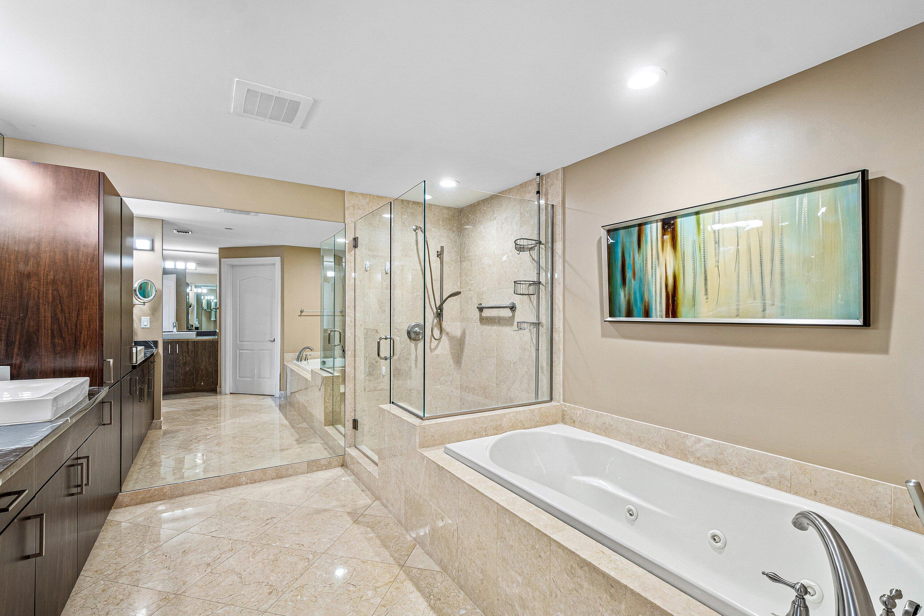 200 East Palmetto Park Road, Unit 22 Boca Raton, FL 33432 - Photo 24 of 44 a bathroom with a bathtub and a shower