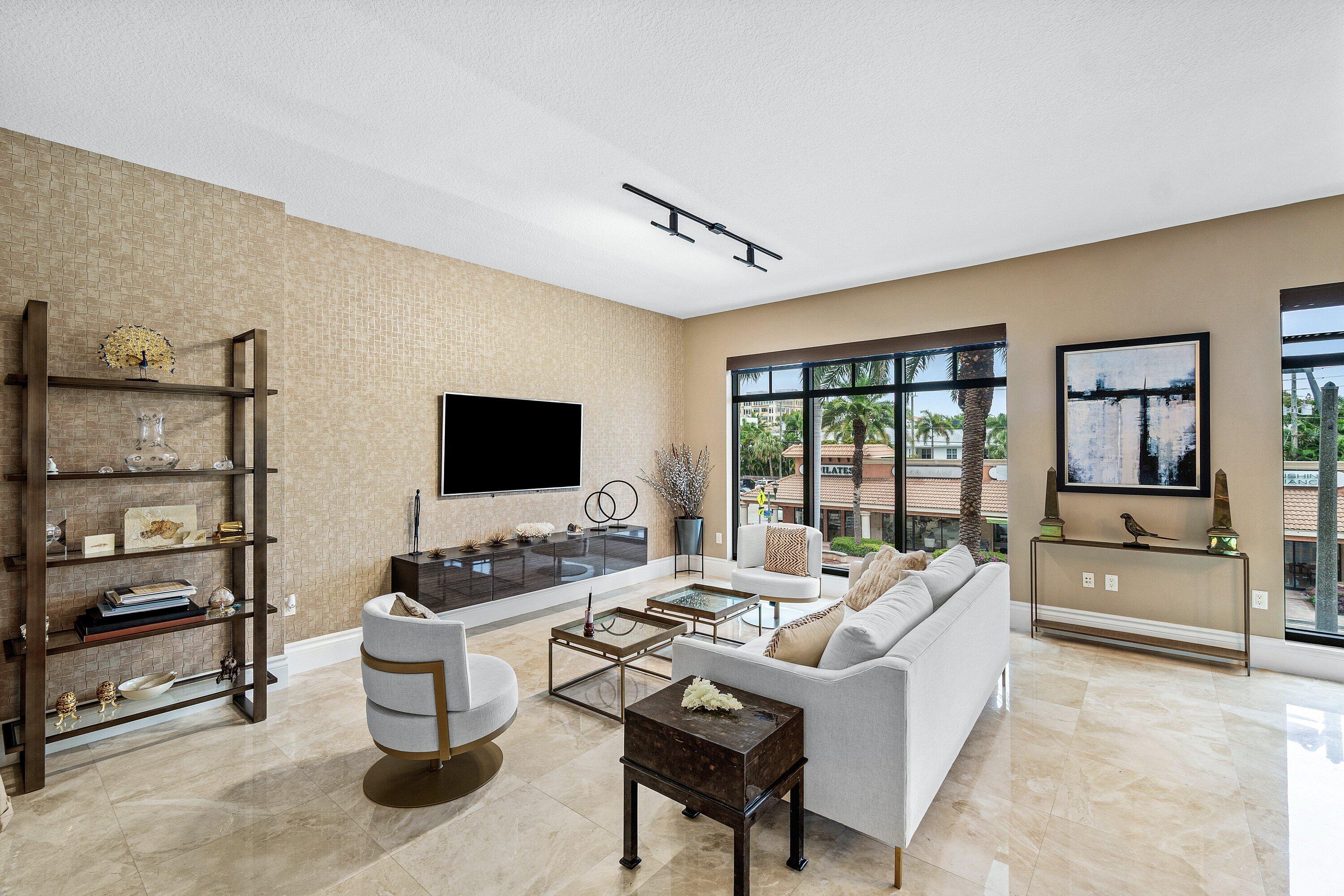 200 East Palmetto Park Road, Unit 22 Boca Raton, FL 33432 - Photo 3 of 44 a living room with furniture and a flat screen tv