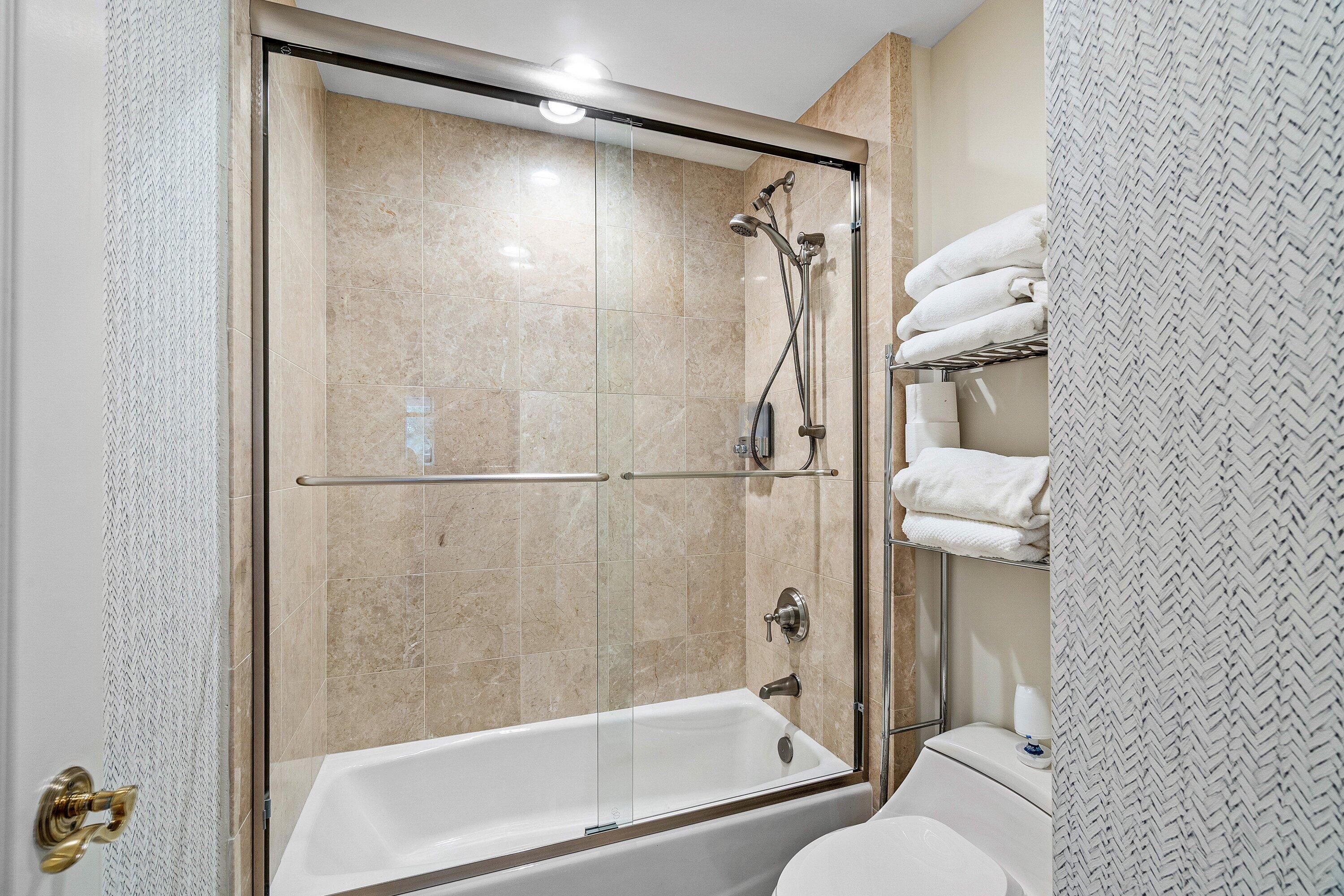 200 East Palmetto Park Road, Unit 22 Boca Raton, FL 33432 - Photo 33 of 44 a bathroom with a shower and a toilet