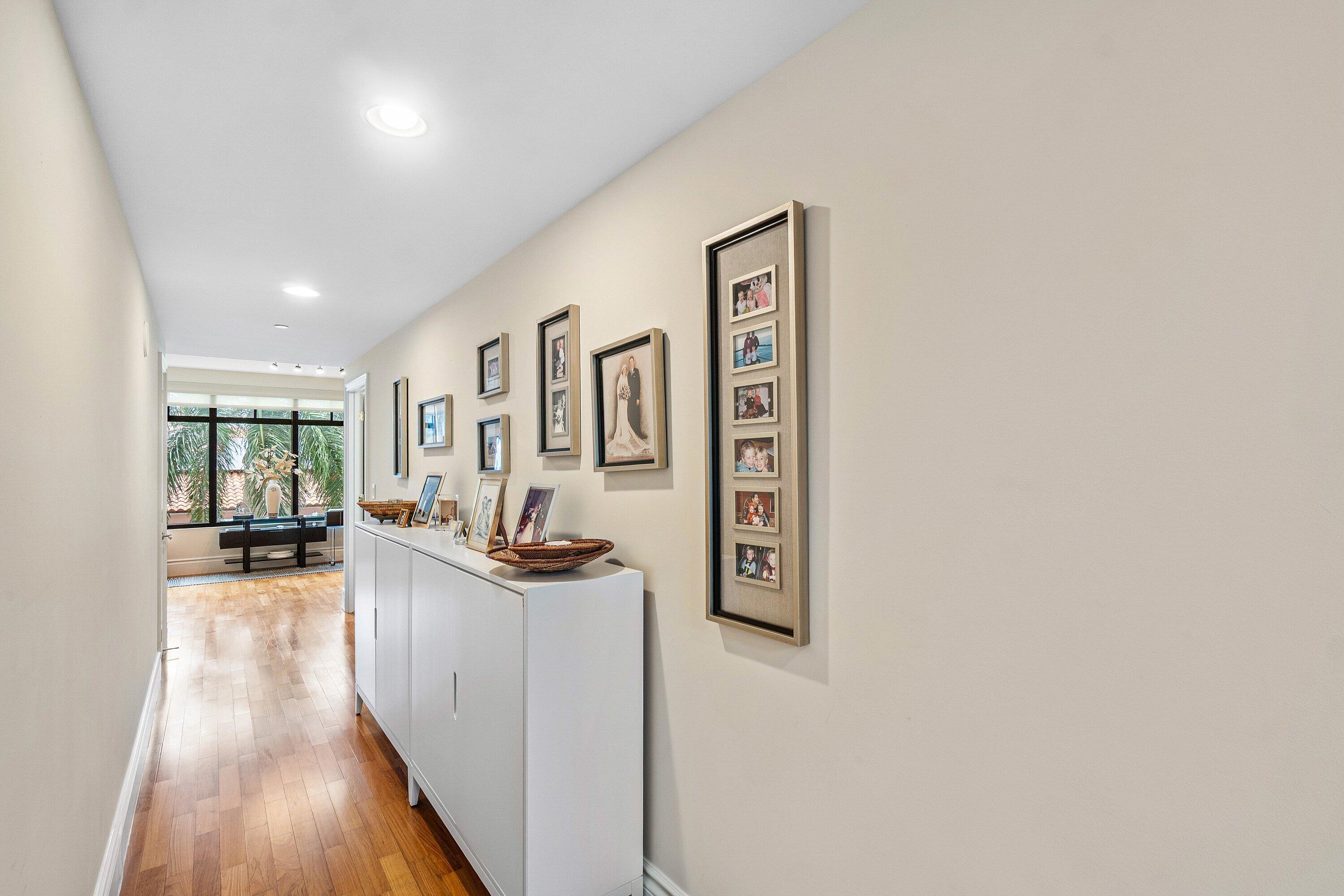 200 East Palmetto Park Road, Unit 22 Boca Raton, FL 33432 - Photo 34 of 44 an empty room with wooden floor and furniture