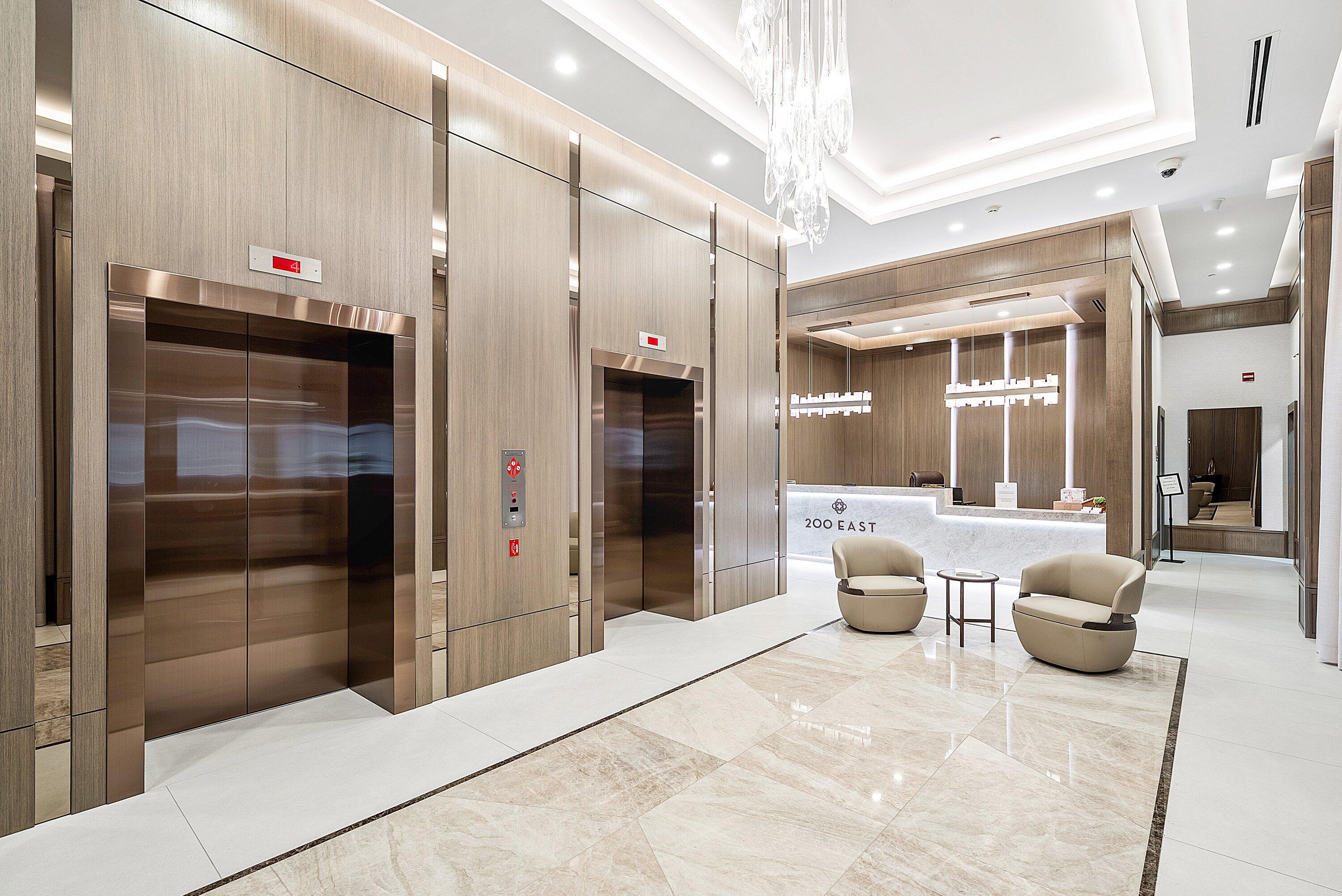 200 East Palmetto Park Road, Unit 22 Boca Raton, FL 33432 - Photo 42 of 44 a large white room with stainless steel appliances kitchen island granite countertop furniture and a refrigerator