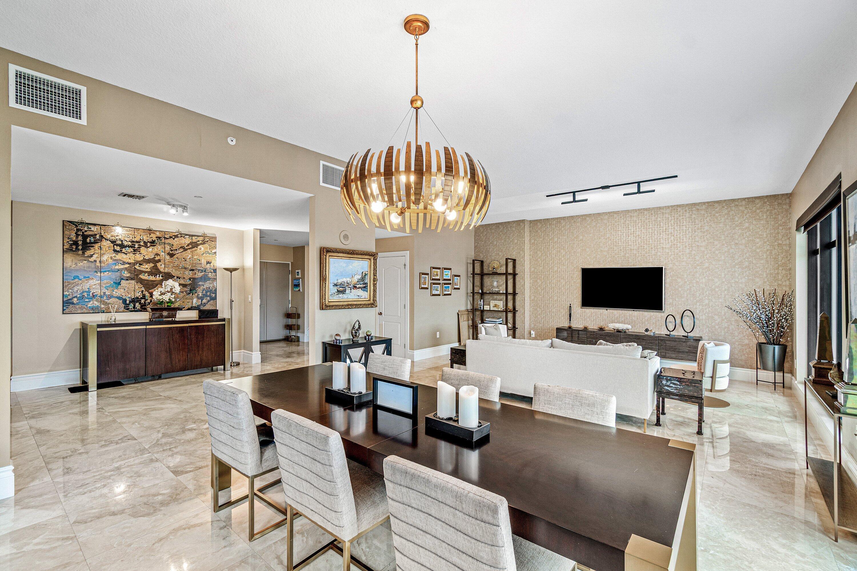 200 East Palmetto Park Road, Unit 22 Boca Raton, FL 33432 - Photo 7 of 44 a living room with fireplace furniture and a flat screen tv