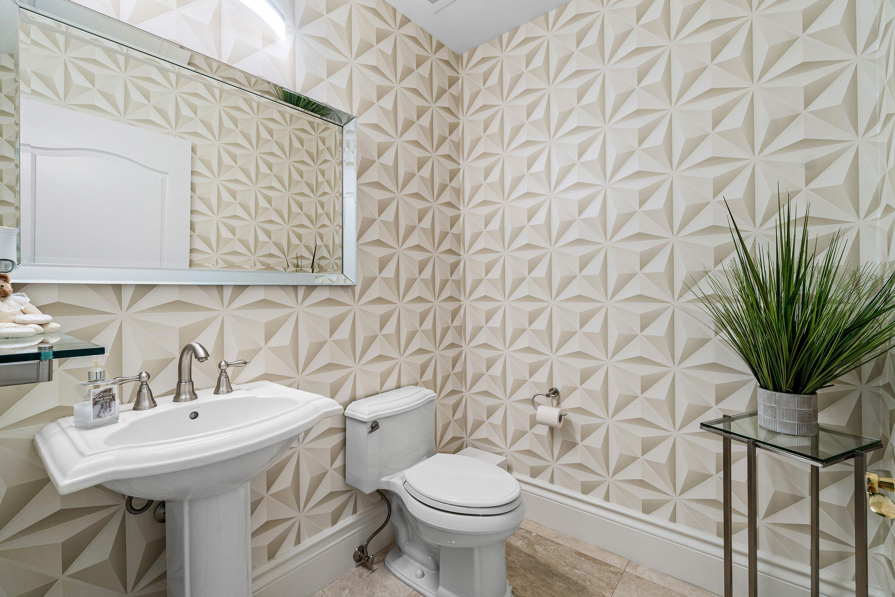 200 East Palmetto Park Road, Unit 22 Boca Raton, FL 33432 - Photo 8 of 44 a bathroom with a sink a toilet and a mirror