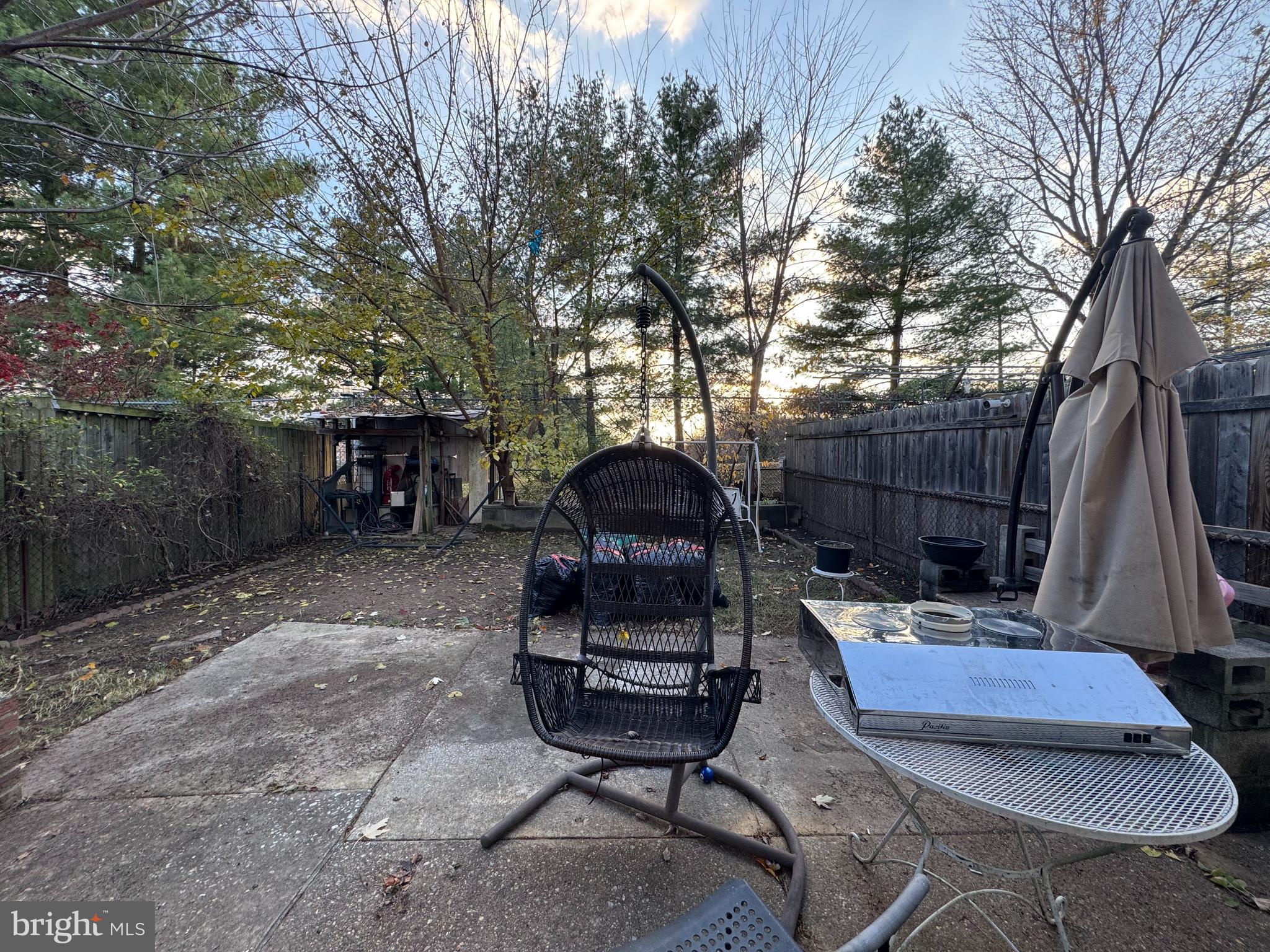 518 Parlin Street Philadelphia, PA 19116 - Photo 17 of 17 a view of a chair and table in backyard