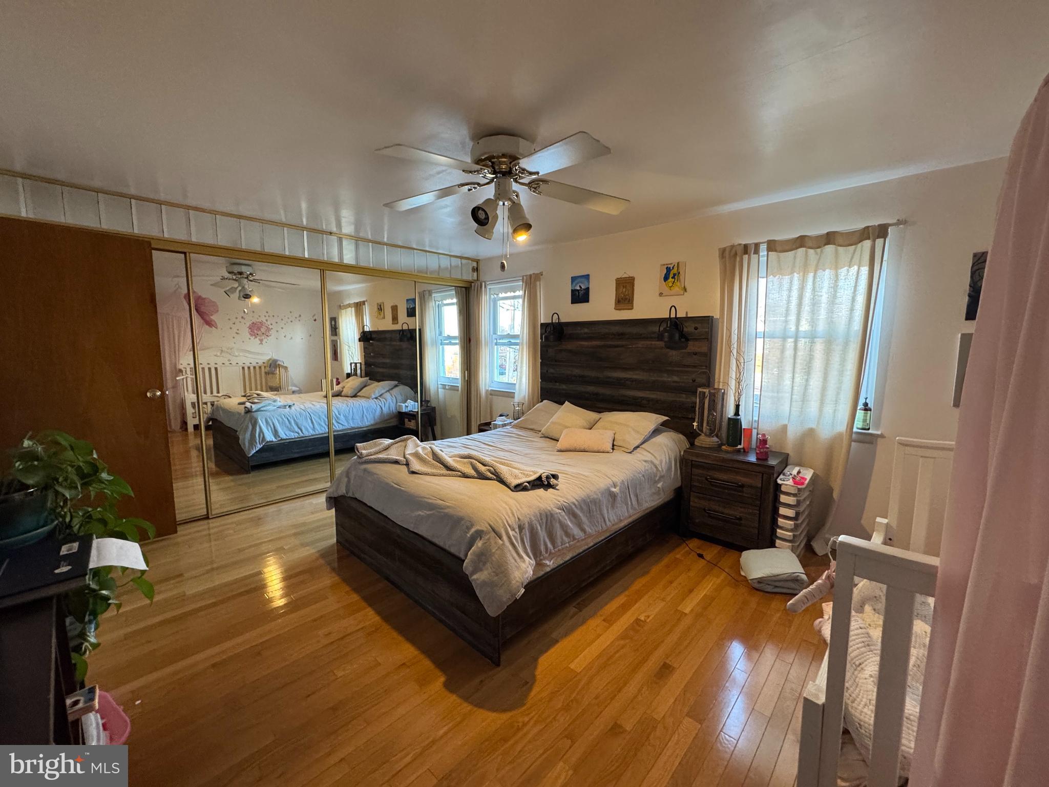 518 Parlin Street Philadelphia, PA 19116 - Photo 3 of 17 a bedroom with a bed potted plant with the outer view