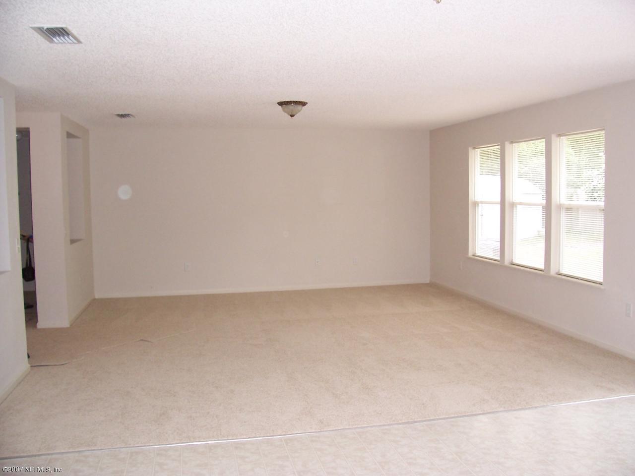 690 Hibernia Road Fleming Island, FL 32003 - Photo 4 of 10 Great room with possibilities