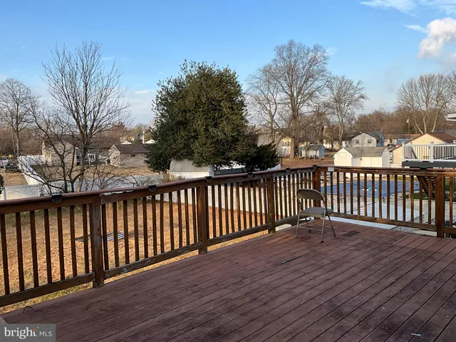 a view of a wooden roof deck