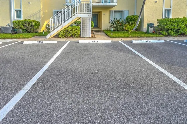 a view of a house with a street