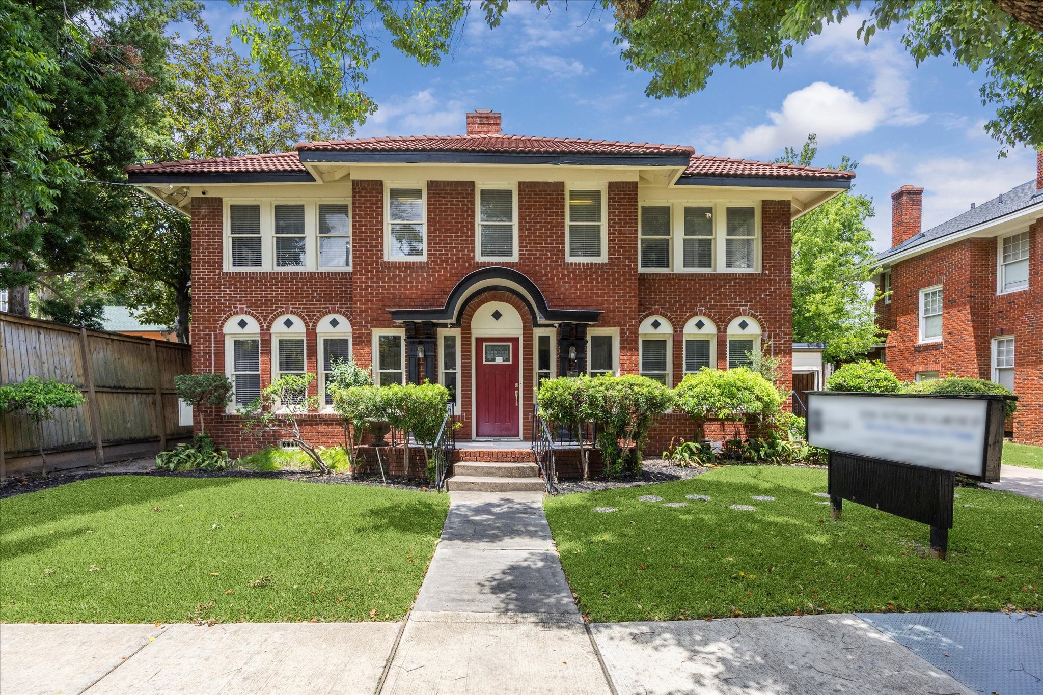 708 Sul Ross Street Houston, TX 77006 - Photo 2 of 30 a front view of a house with garden and porch