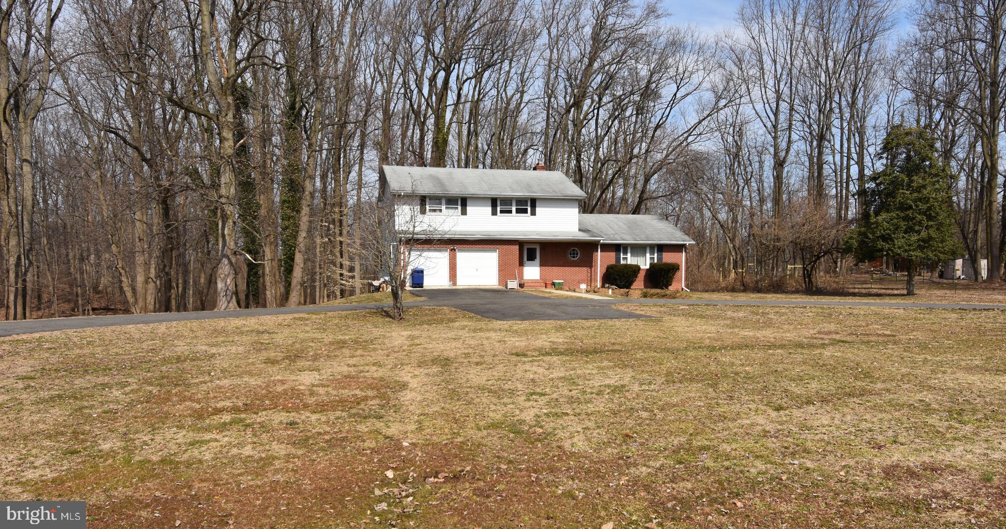 1271 Old York Road Burlington, NJ 08016 - Photo 1 of 17 a front view of a house with a yard