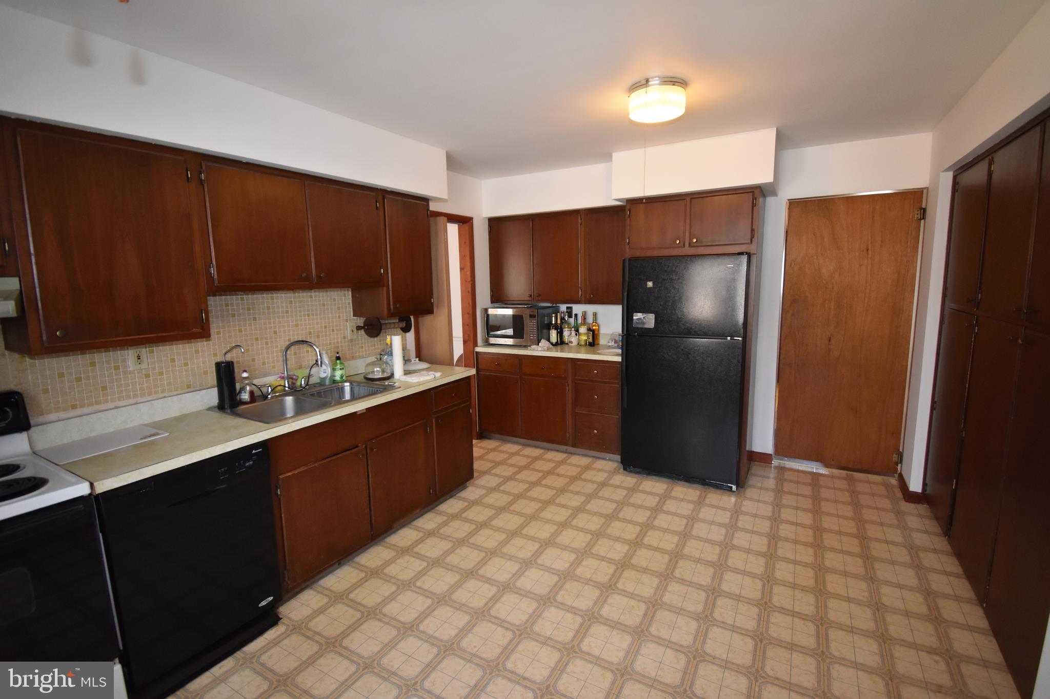 1271 Old York Road Burlington, NJ 08016 - Photo 5 of 17 a kitchen with stainless steel appliances granite countertop a refrigerator and a sink