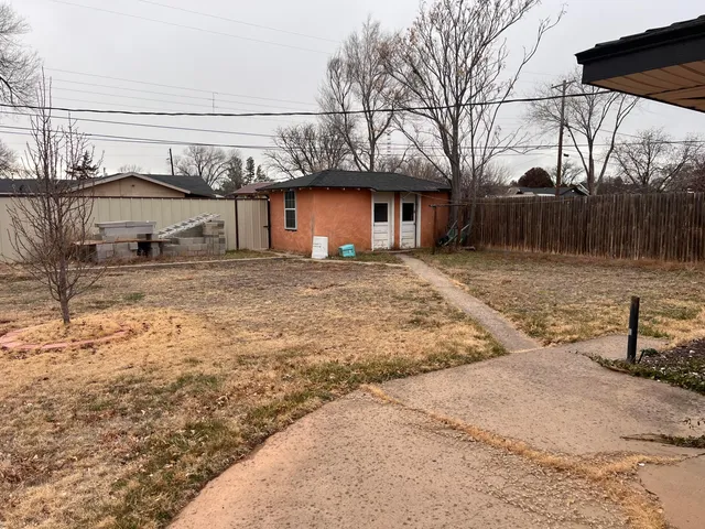 a house view with a outdoor space