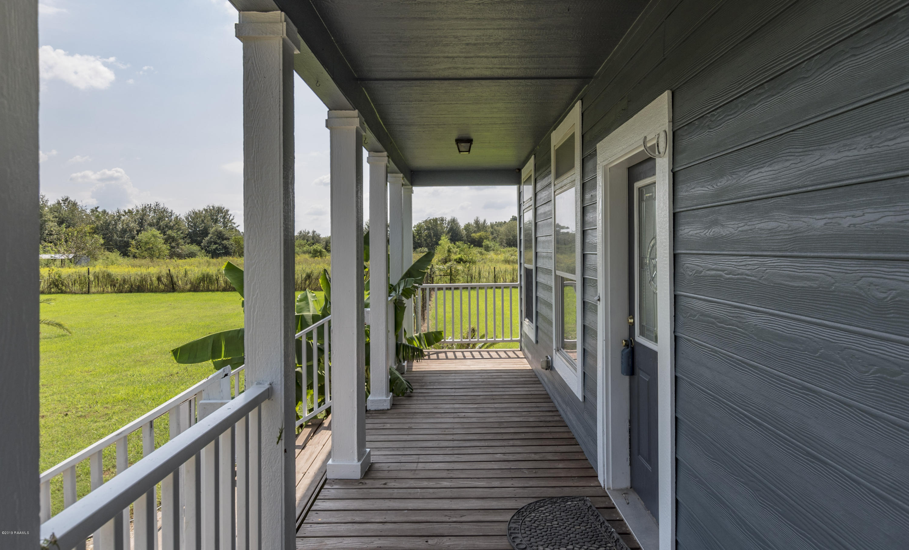 935 Toby Mouton Road Duson, LA 70529 - Photo 2 of 40 Front Porch 1
