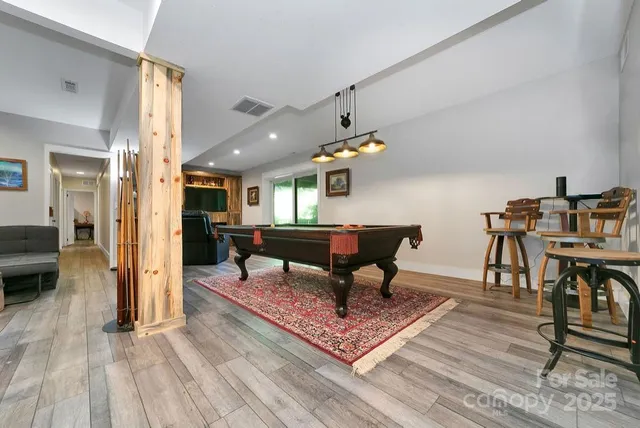 a living room with furniture and a table