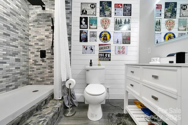 a bathroom with a sink toilet and bathtub