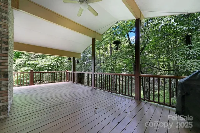 a view of balcony with wooden floor
