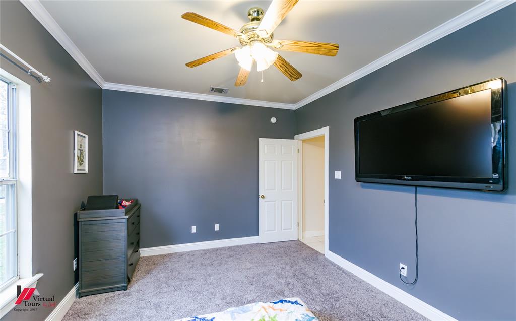 266 Stark Road Stonewall, LA 71078 - Photo 26 of 39 a view of a livingroom with a flat screen tv