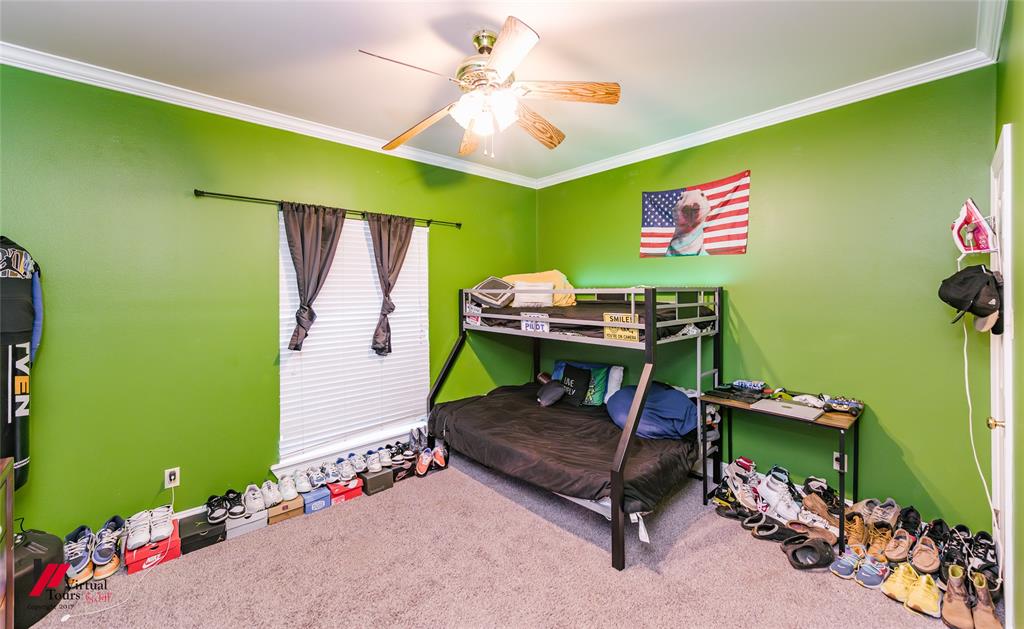 266 Stark Road Stonewall, LA 71078 - Photo 29 of 39 a room with furniture and a potted plant