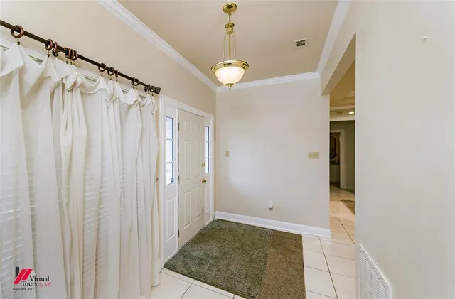 a room with furniture and a flat screen tv