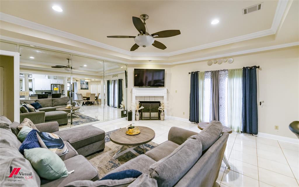 266 Stark Road Stonewall, LA 71078 - Photo 9 of 39 a living room with furniture kitchen view and a large window