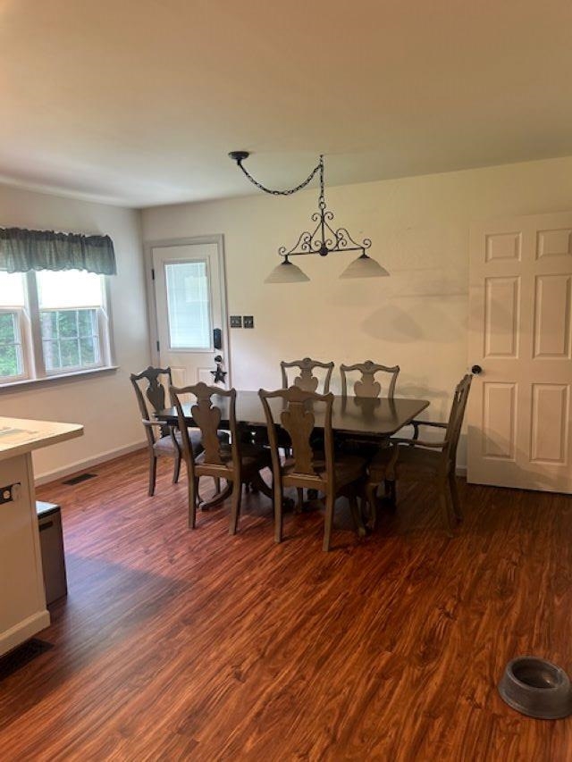 120 Head Of River Road Corbin City, NJ 08270 - Photo 16 of 20 a view of a dining room with furniture and wooden floor