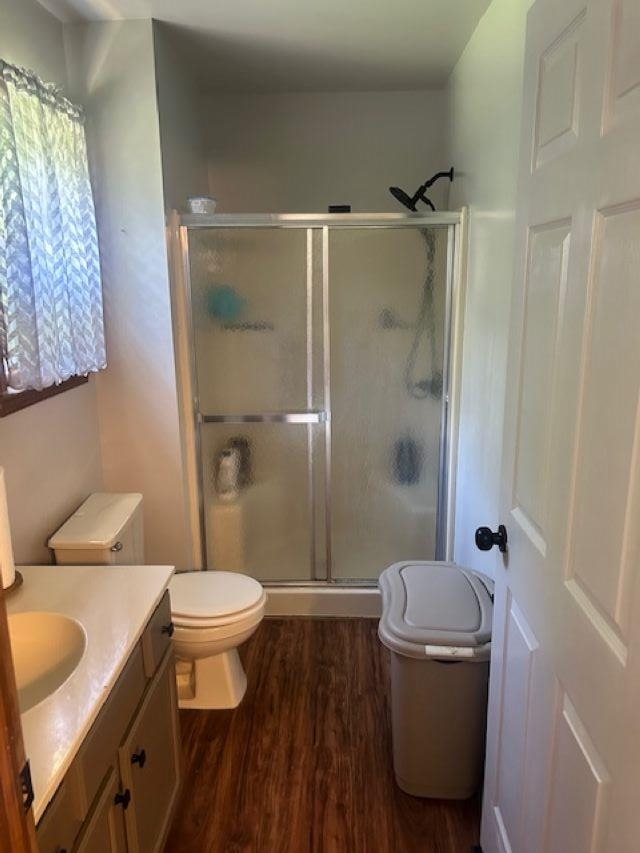 120 Head Of River Road Corbin City, NJ 08270 - Photo 5 of 20 a bathroom with a granite countertop sink toilet a mirror and shower