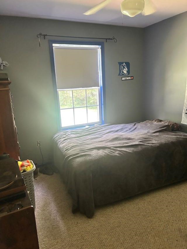 120 Head Of River Road Corbin City, NJ 08270 - Photo 8 of 20 a bedroom with a bed and a window