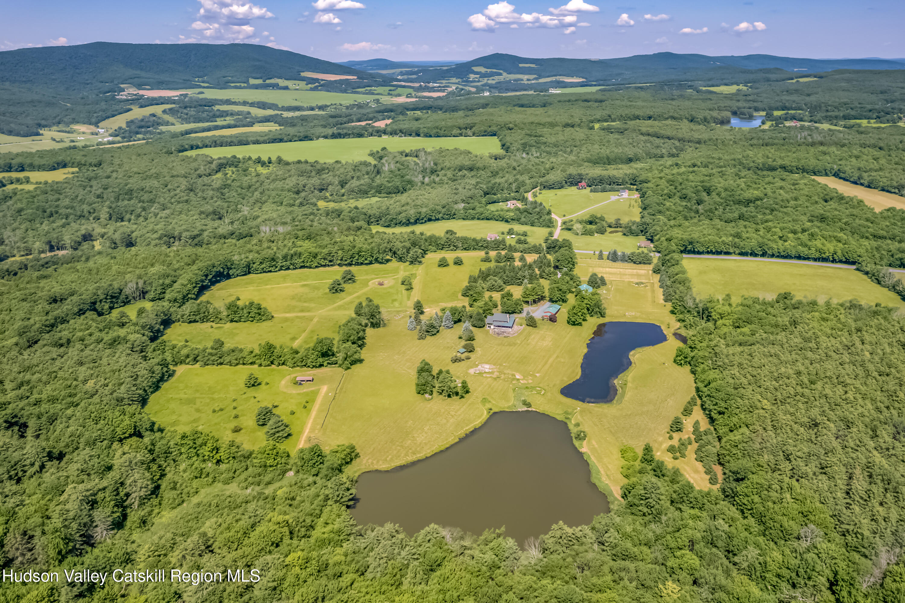 688 Bruce Porn Road Gilboa, NY 12167 - Photo 21 of 104 a view of a lake with a mountain in the background