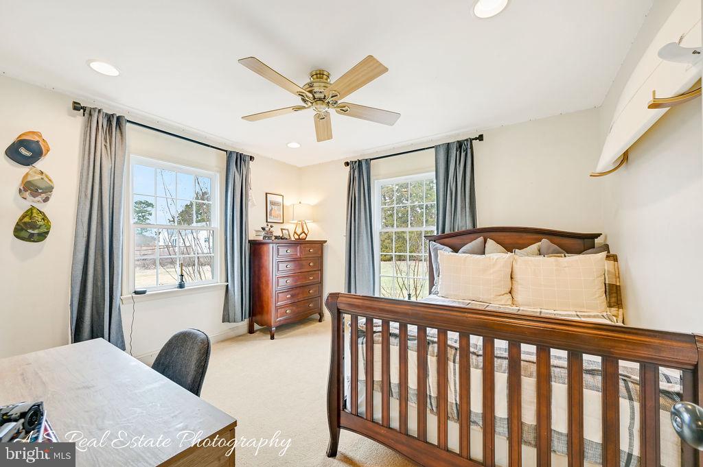 30019 Mt Vernon Road Princess Anne, MD 21853 - Photo 20 of 28 a bedroom with furniture and a large window